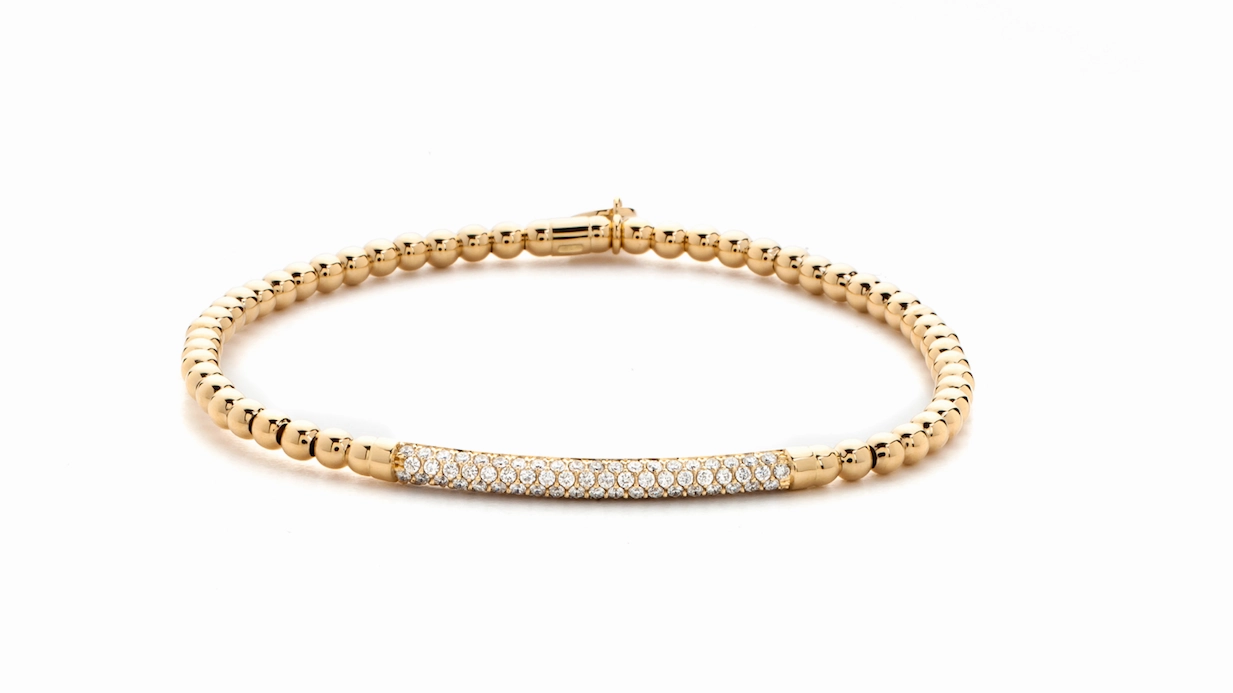 Yellow gold stretch bracelet with diamonds