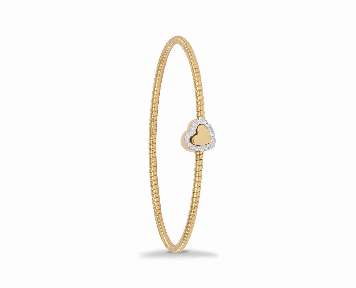 Yellow gold tubo bangle bracelet with a diamond star
